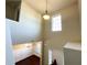 View of the foyer with high ceilings, decorative chandelier, and a well-lit entrance at 2378 Misty Ivy Ct, Buford, GA 30519