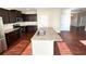 Modern kitchen with granite countertops, stainless steel appliances, and ample cabinet space at 2378 Misty Ivy Ct, Buford, GA 30519