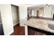 Spacious kitchen featuring granite countertops, stainless steel appliances, and a walk-in pantry at 2378 Misty Ivy Ct, Buford, GA 30519