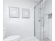 Bright bathroom with a walk-in shower, white subway tiles, gray accents, and modern fixtures at 2730 Burtz Dr, Marietta, GA 30068