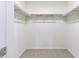 Spacious walk-in closet with ample shelving and rod space for organized storage at 2730 Burtz Dr, Marietta, GA 30068