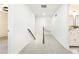 Hallway features stairs to the second floor and a view of the bathroom at 2730 Burtz Dr, Marietta, GA 30068