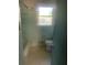 Cozy bathroom featuring a ceramic tiled shower and toilet at 3178 Beech Dr, Decatur, GA 30032