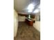 Spacious kitchen featuring ample wooden cabinetry and tiled flooring at 3178 Beech Dr, Decatur, GA 30032