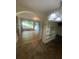 Open concept living room and dining area with hardwood floors and nice arches at 3178 Beech Dr, Decatur, GA 30032