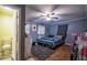 Blue bedroom with a bed and blue decorations at 8053 Duralee Ln, Douglasville, GA 30134