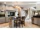 Spacious kitchen with stainless steel appliances, a central island, and modern cabinetry at 1125 Lake Shore Overlook, Alpharetta, GA 30005