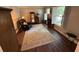 Inviting living room features a comfortable armchair, and a decorative area rug at 1153 Staples Sw Dr, Lilburn, GA 30047