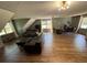 Bright living area with comfortable seating, natural light and wood flooring at 1153 Staples Sw Dr, Lilburn, GA 30047