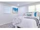 Cozy bedroom with bright natural light, a comfortable bed, and stylish decor accents at 317 Community Sw Dr, Mableton, GA 30126