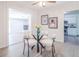 Bright breakfast nook features modern lighting, stylish decor, and contemporary furnishings at 317 Community Sw Dr, Mableton, GA 30126
