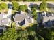 Expansive property featuring lush backyard with patio, firepit, mature trees, and a large driveway at 330 Bay Grove Rd, Loganville, GA 30052