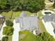 Expansive backyard with lush landscaping, privacy fence, pool, outdoor structure and verdant lawns at 330 Bay Grove Rd, Loganville, GA 30052