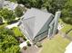 An overhead view of the home shows the fenced backyard with a fire pit at 330 Bay Grove Rd, Loganville, GA 30052