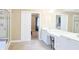 Spacious bathroom complete with a shower, vanity, and tile flooring at 330 Bay Grove Rd, Loganville, GA 30052
