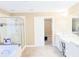 Spacious bathroom complete with a shower, vanity, and tile flooring at 330 Bay Grove Rd, Loganville, GA 30052