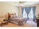 Cozy bedroom with neutral tones, large windows and ample natural light at 330 Bay Grove Rd, Loganville, GA 30052