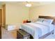 Bedroom featuring ceiling fan, bed, and carpeted floors at 330 Bay Grove Rd, Loganville, GA 30052