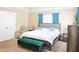 Inviting bedroom featuring a king bed, plush seating, and ample natural light at 330 Bay Grove Rd, Loganville, GA 30052