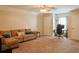 Large bonus room with a comfortable seating area and desk space, offering flexibility and comfort at 330 Bay Grove Rd, Loganville, GA 30052