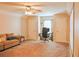 Large bonus room with a comfortable seating area and desk space, perfect for entertaining or relaxing at 330 Bay Grove Rd, Loganville, GA 30052