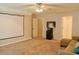 Large bonus room with a comfortable seating area, offering flexibility and comfort at 330 Bay Grove Rd, Loganville, GA 30052