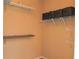 Organized closet with shelving for storage and clothing at 330 Bay Grove Rd, Loganville, GA 30052