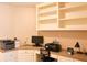 Bright home office features a desk and built-in shelving, ideal for remote work at 330 Bay Grove Rd, Loganville, GA 30052