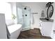 Bright bathroom with a glass-enclosed shower, granite countertops, and modern fixtures at 4811 Lake Park Ter, Acworth, GA 30101