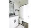 Full bathroom featuring granite countertops, modern fixtures, and a shower with a white curtain at 4811 Lake Park Ter, Acworth, GA 30101