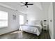 Bedroom with vaulted ceiling, modern lamps and an abundance of natural light at 4811 Lake Park Ter, Acworth, GA 30101