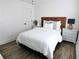 Cozy bedroom featuring a bed and gray nightstands at 4811 Lake Park Ter, Acworth, GA 30101