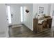 Bright foyer with wood-look flooring, white walls, and stylish decor at 4811 Lake Park Ter, Acworth, GA 30101