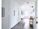 Hallway with built-in storage cabinets and modern fixtures at 4811 Lake Park Ter, Acworth, GA 30101