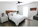 Bright bedroom with wood floors, a ceiling fan, and modern decor at 4811 Lake Park Ter, Acworth, GA 30101
