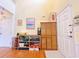Hallway featuring hardwood floors, shoe storage and lots of natural light at 634 Friars Head Dr, Suwanee, GA 30024