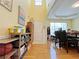 Hallway with high ceilings and wood floors provides lots of space at 634 Friars Head Dr, Suwanee, GA 30024