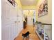 Hallway featuring hardwood floors and artwork on the walls at 634 Friars Head Dr, Suwanee, GA 30024