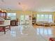 Open floor plan seamlessly connects the kitchen, dining area, and a comfortable living room at 634 Friars Head Dr, Suwanee, GA 30024