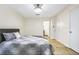 Cozy bedroom boasts a queen bed and two entryways for convenient access at 906 Country Park Se Dr, Smyrna, GA 30080
