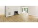 Living room featuring wood-look floors and a fireplace at 906 Country Park Se Dr, Smyrna, GA 30080