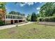 View of the lovely backyard of this home, featuring a lawn and shed at 243 Woodview Ln, Smyrna, GA 30082