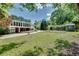 View of the lovely backyard of this home, featuring a lawn and shed at 243 Woodview Ln, Smyrna, GA 30082