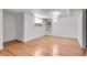 Finished basement features hardwood floors, white walls, and a small window at 243 Woodview Ln, Smyrna, GA 30082