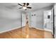 Bedroom with hardwood floors, neutral paint and closet space at 243 Woodview Ln, Smyrna, GA 30082