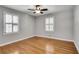 Bedroom with hardwood floors, neutral walls and shuttered windows at 243 Woodview Ln, Smyrna, GA 30082