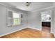 Dining room features hardwood floors, neutral walls and access to kitchen at 243 Woodview Ln, Smyrna, GA 30082