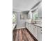 Updated kitchen featuring granite countertops, stainless steel appliances, and ample cabinet space at 243 Woodview Ln, Smyrna, GA 30082