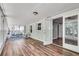 Inviting sunroom with multiple windows, comfortable seating, and access to the main house at 243 Woodview Ln, Smyrna, GA 30082