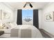 Cozy bedroom with large windows offering a city view and stylish décor at 2479 Peachtree Ne Rd # 1801, Atlanta, GA 30305